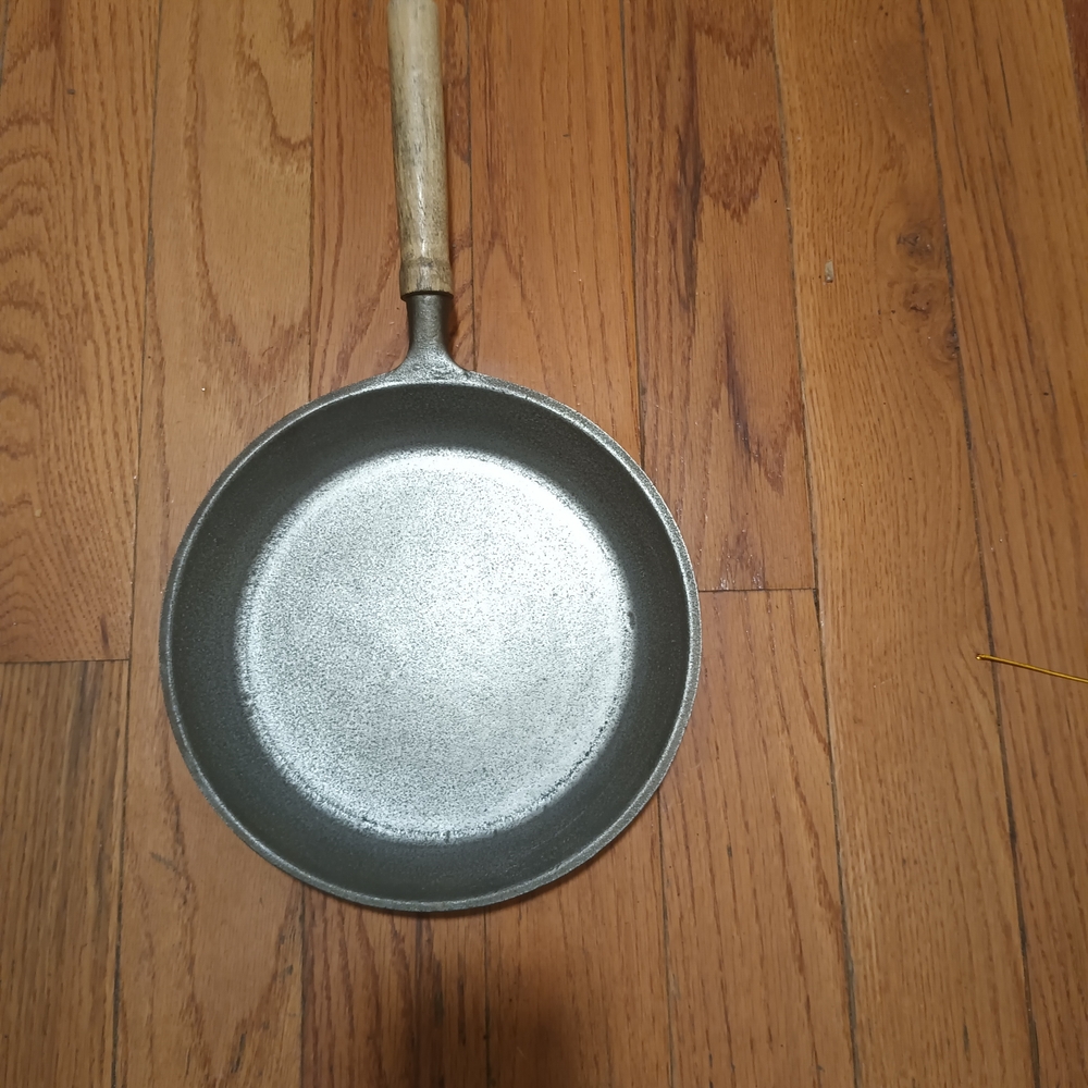 Classic Gray Cast Iron Frying Pan with Wooden Handle